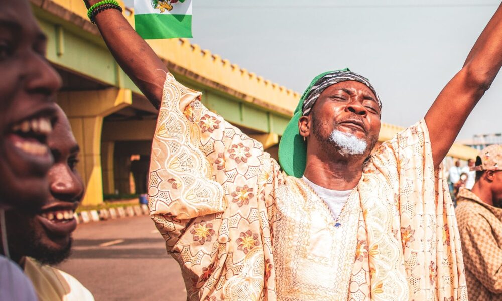 nigerian man with flag