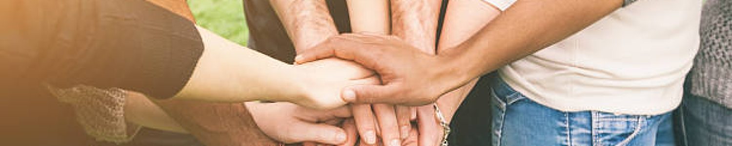 Multiracial Group of Friends with Hands in Stack, Teamwork